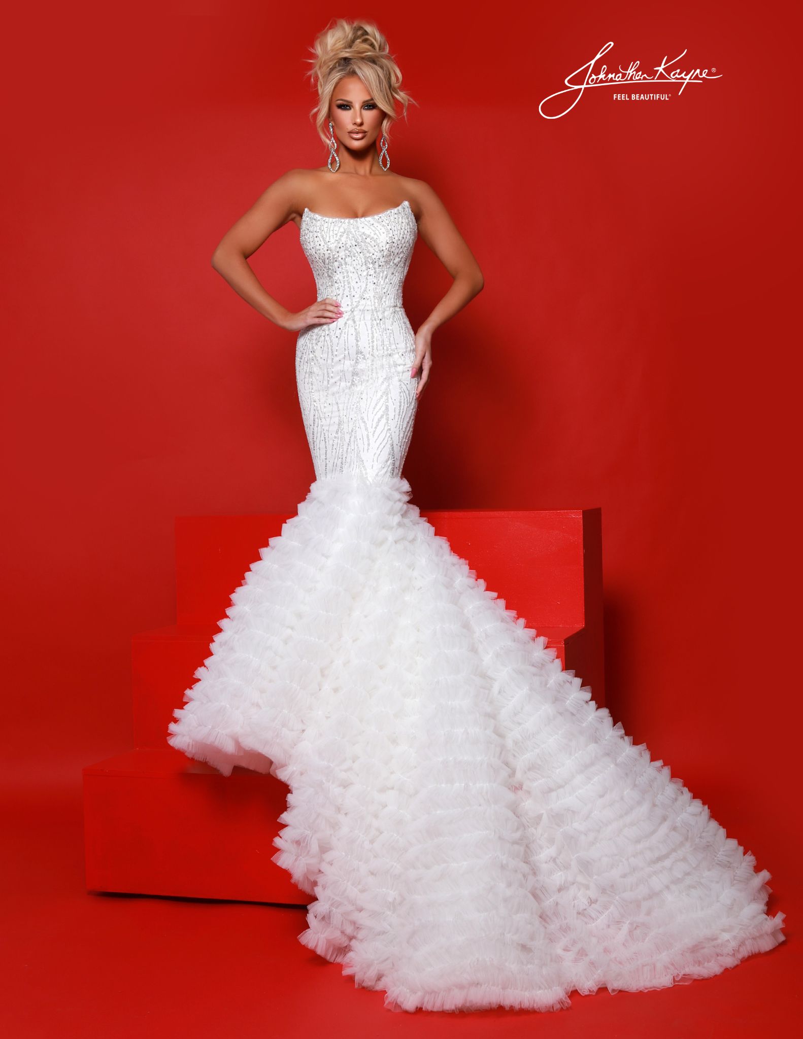 White strapless mermaid gown with rhinestone beading. Ideal for pageant finals, destination wedding, bridal gown, homecoming court, or statement prom looks.